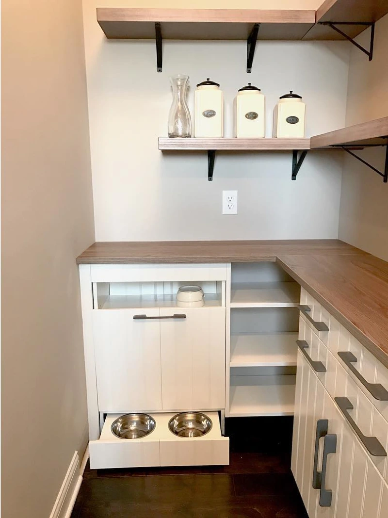 White Lower Cabinetry with Pull-Out Bottom Drawer Pet Bowls